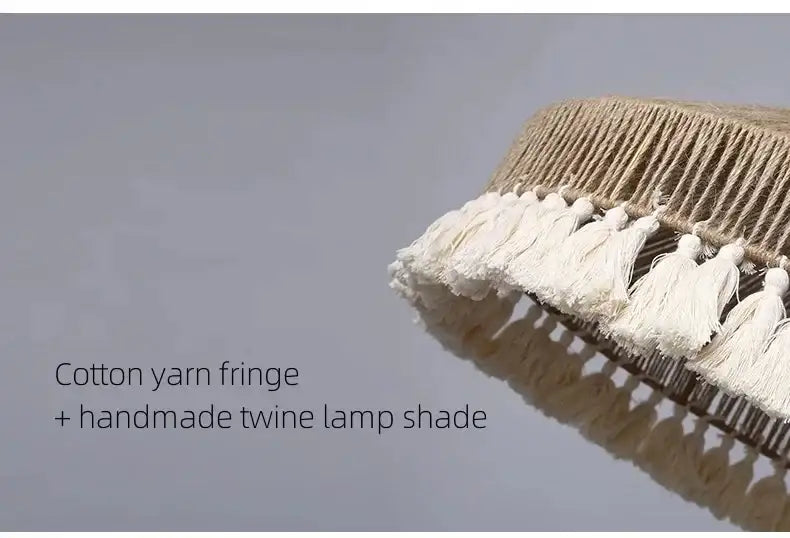 Handmade twine lamp shade with cotton yarn fringe on a gray background Besontique Home