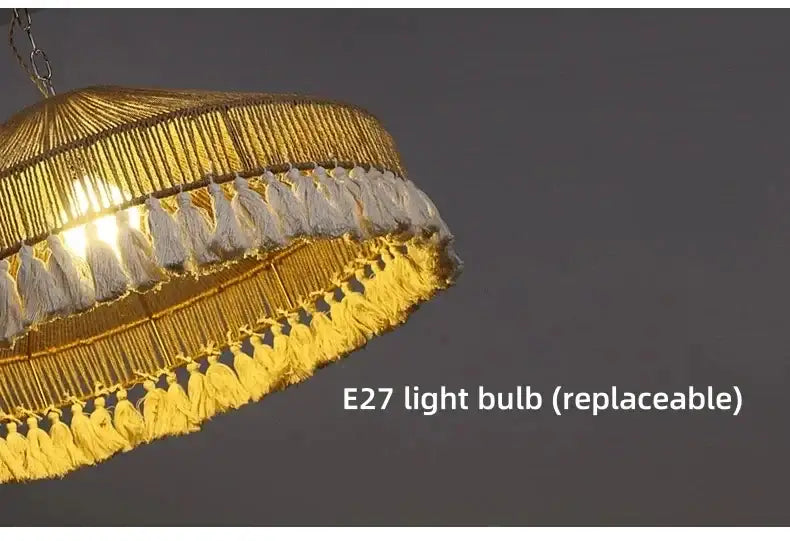 Decorative light fixture with tassels and text indicating E27 light bulb replaceability on a dark background Besontique Home