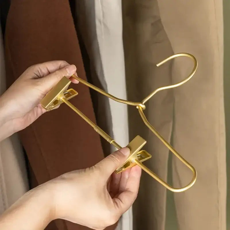 slim-gold-skirts-pants-hangers-with-clips-sleek-metal-clothes-wardrobe-trouser-rack-besontique-home-98259 - Besontique Home