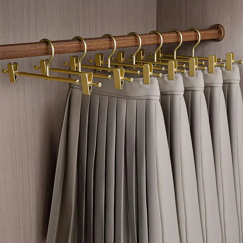solid-matte-goldsilver-non-slip-skirts-pants-hangers-clothes-wardrobe-trouser-rack-with-adjustable-clips-besontique-home-63514 - Besontique Home